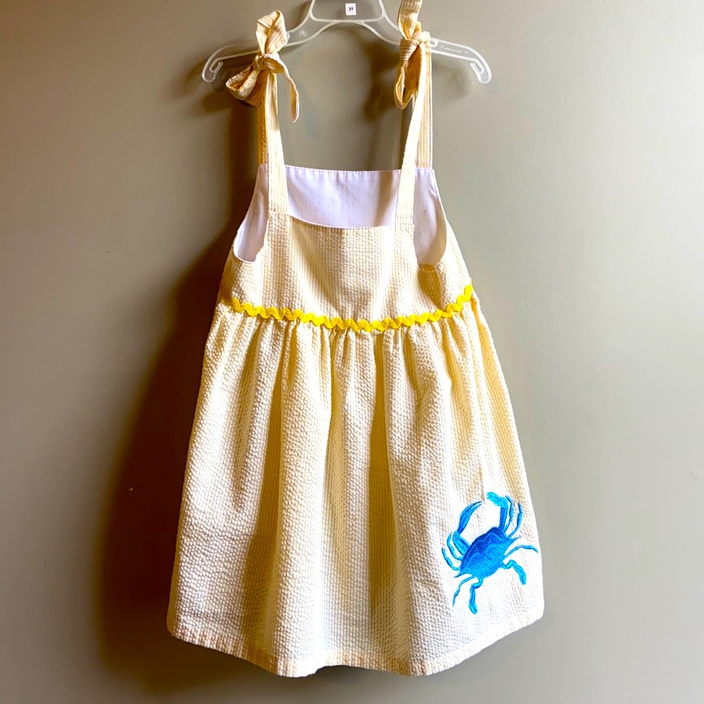 EUC Yellow and White seersucker top and shorts set with blue crab.